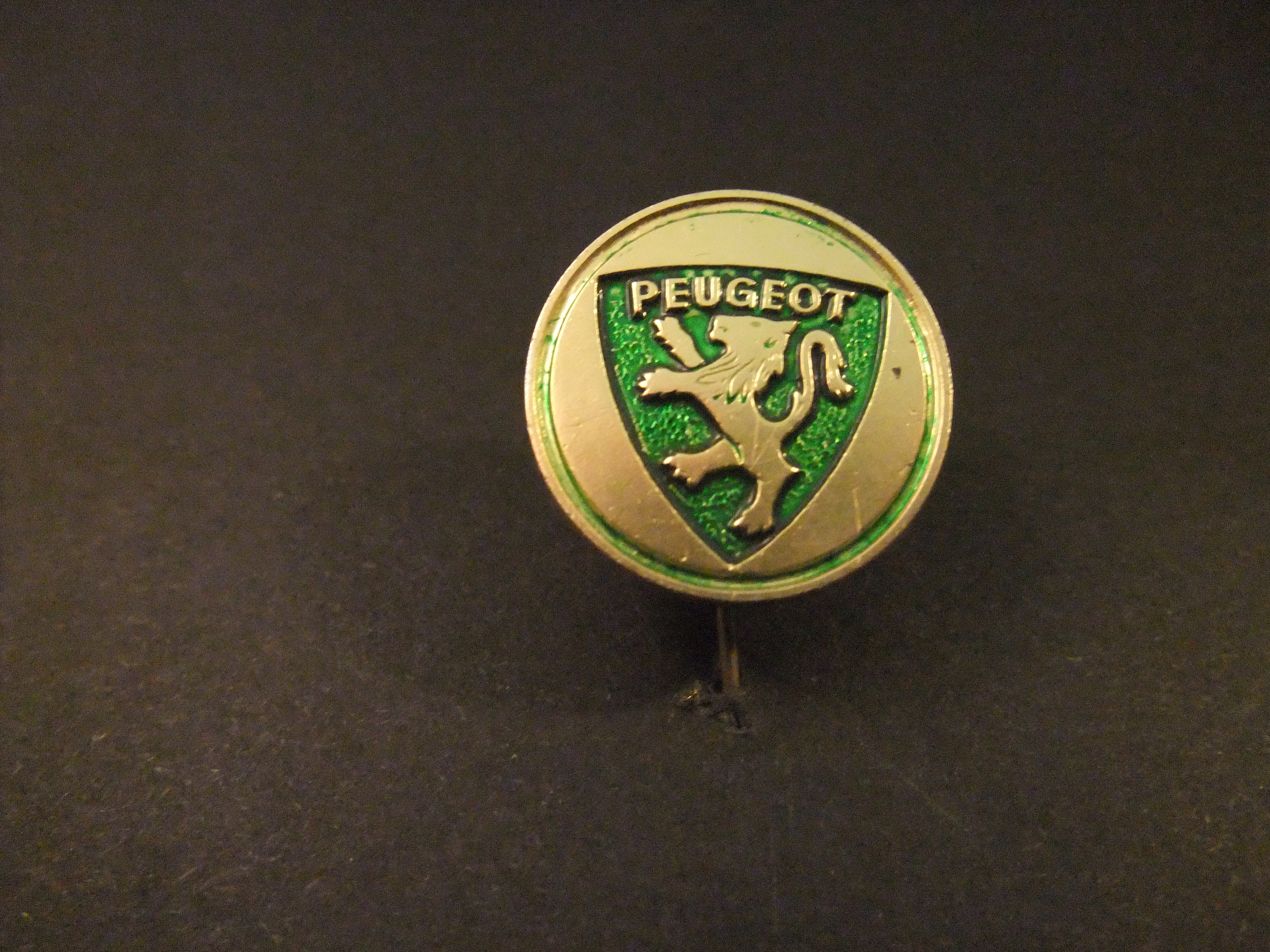 Peugeot auto logo groen-zilverkleurig